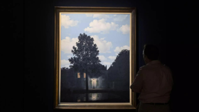 Rene Magritte's surreal painting titled 'Empire of Light' breaks auction records, sells for ...